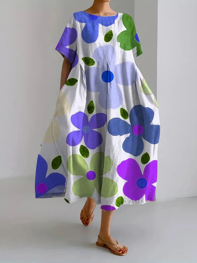 Eliana | Robe midi fleurie et joyeuse pour des journées d'été insouciantes